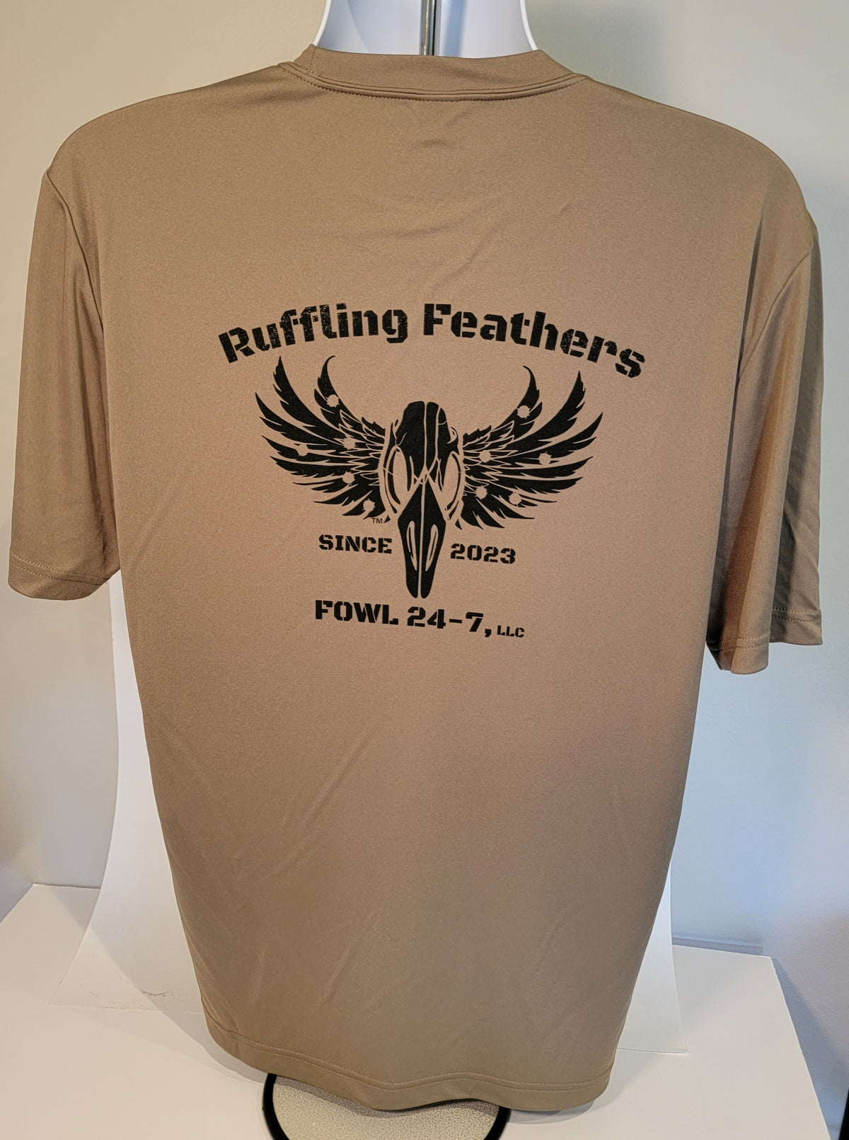 FOWL 24-7 Sport-Tek performance short sleeve tee - "Ruffling Feather since 2023" on back.